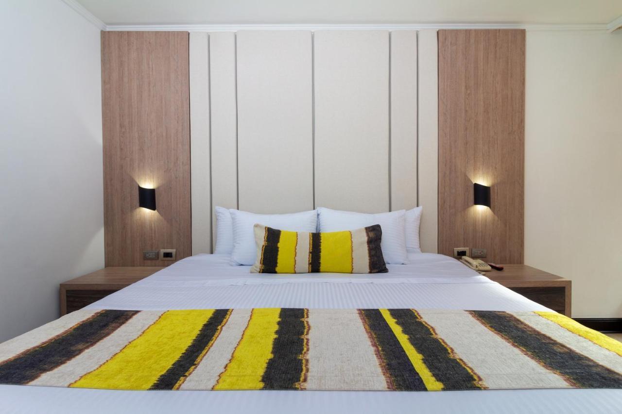 Hotel Dann Carlton Belfort Μεντεγίν Εξωτερικό φωτογραφία A bedroom at the hotel