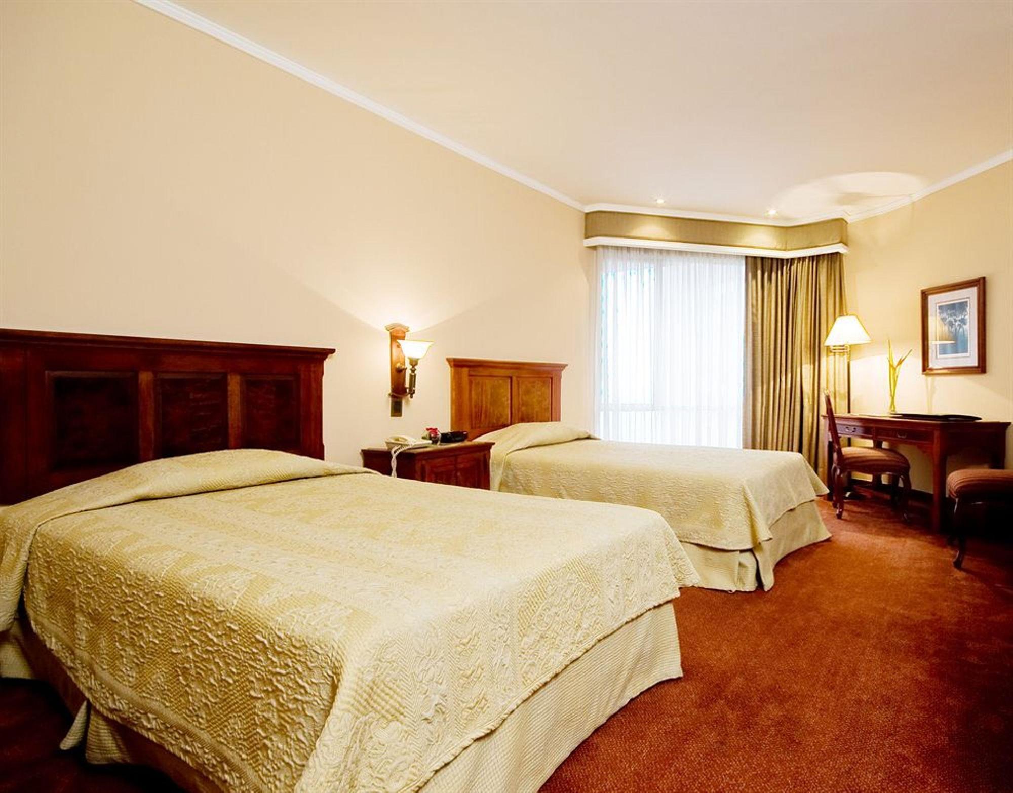 Hotel Dann Carlton Belfort Μεντεγίν Εξωτερικό φωτογραφία A room at the hotel