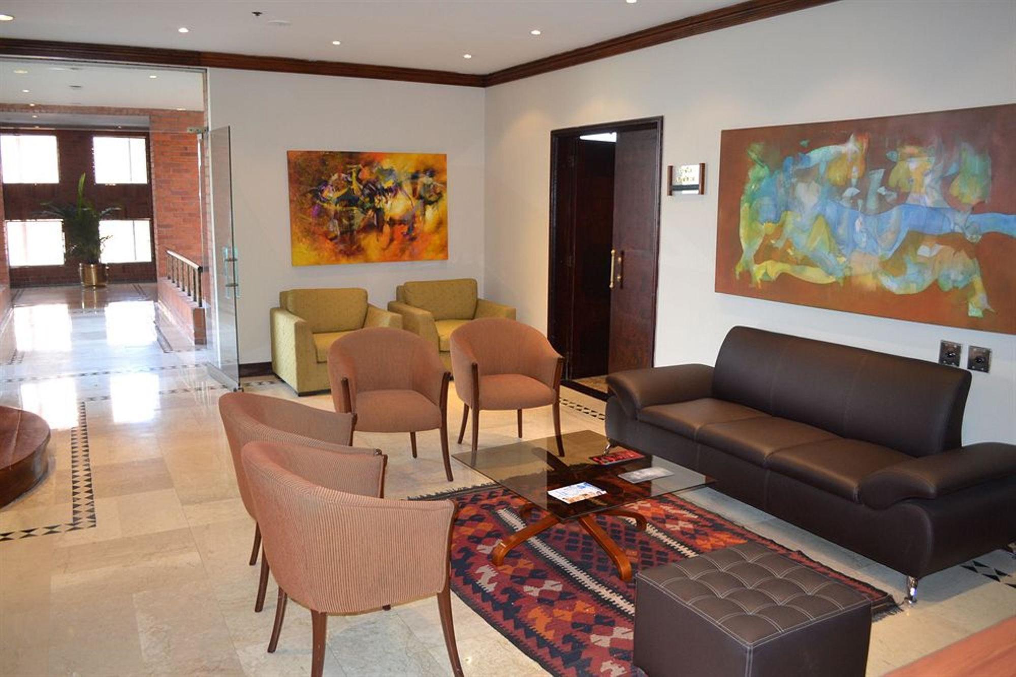 Hotel Dann Carlton Belfort Μεντεγίν Εξωτερικό φωτογραφία The lobby of the hotel